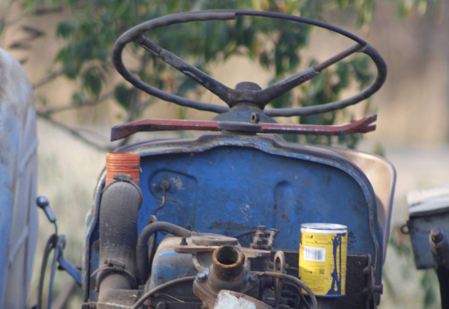 Rust, Smoke… and Restart: Why Older People Still Matter An old tractor on the farm